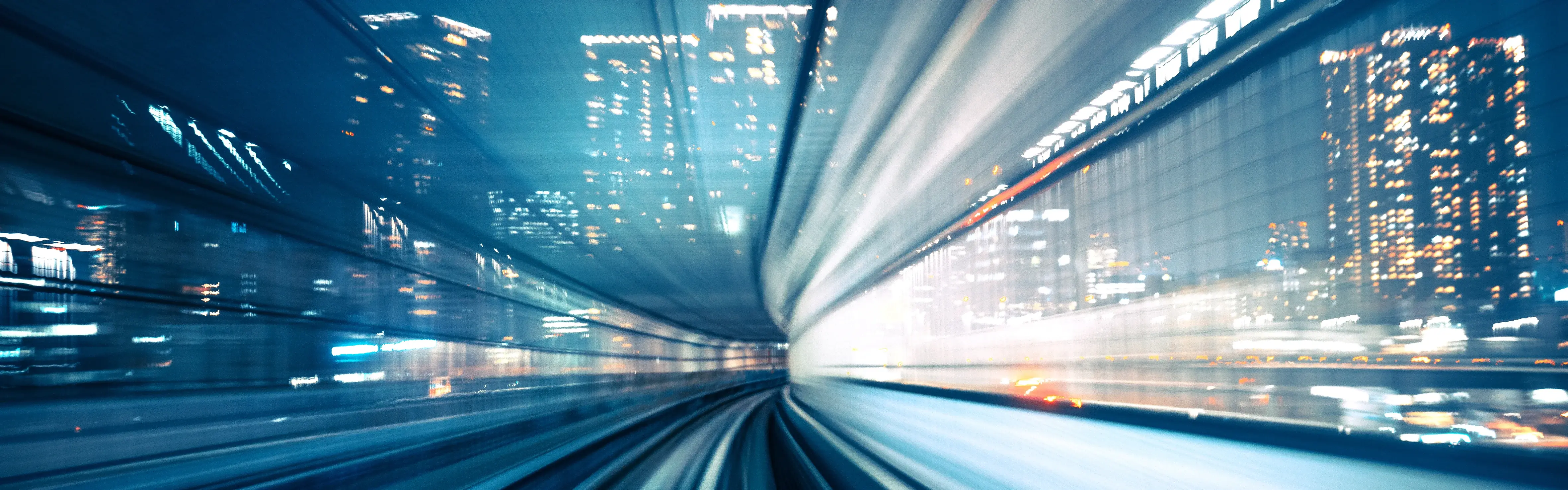 Motion blur of train moving to City