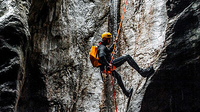 GRC Mountaineer climbing a rocky slope