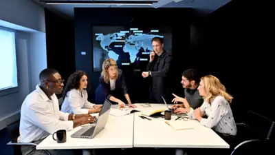 6 personnes dans une salle de réunion, avec un graphique projeté à l'écran