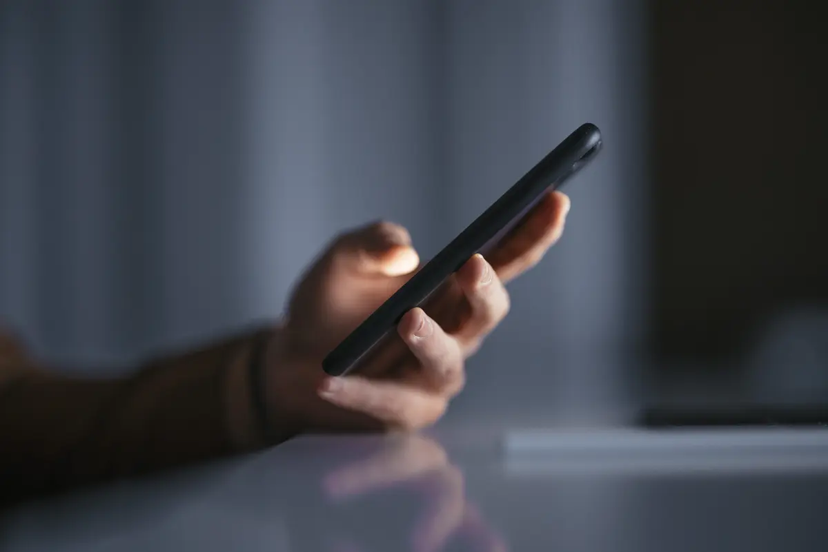 Hand holding a mobile phone